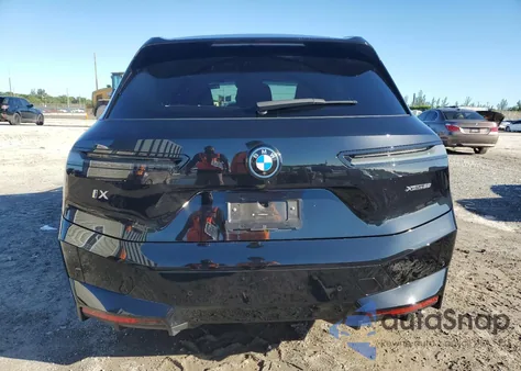 2025 BMW Ix xDrive50 из США, поврежденный, VIN WB523CF02SCT46332